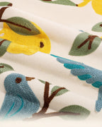 Le coussin d'appoint brodé main Citron et Passereau